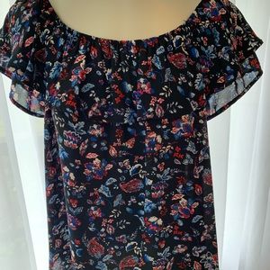 Black/floral off shoulder, split back blouse.